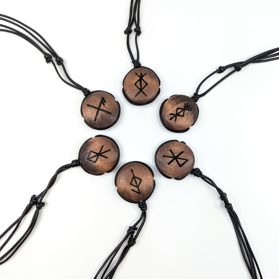 Circular wooden Norse symbol pendants on black cord necklaces adjustable length