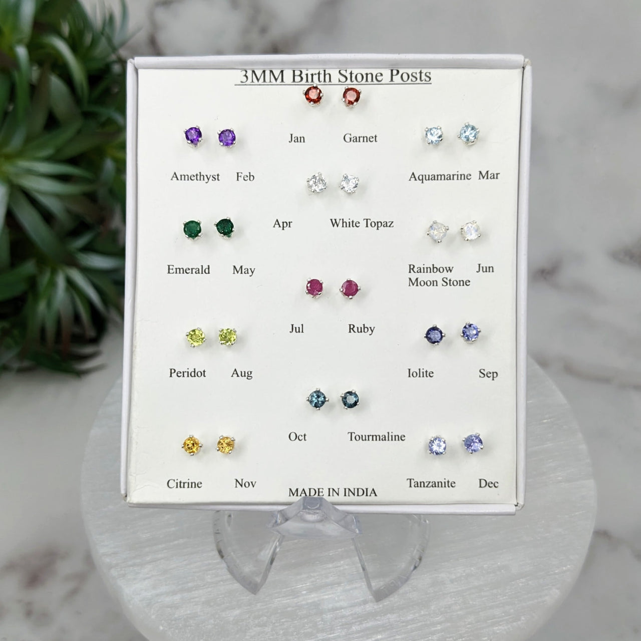 Birthstone Gem Sterling Silver Stud Earrings in display, customizable by month and stone shape