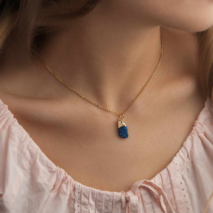 Delicate gold chain necklace with blue teardrop birthstone pendant, 16-18 adjustable
