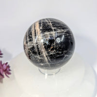 Polished 2.4-inch Black Moonstone Sphere #BC0252 with White Golden Streaks