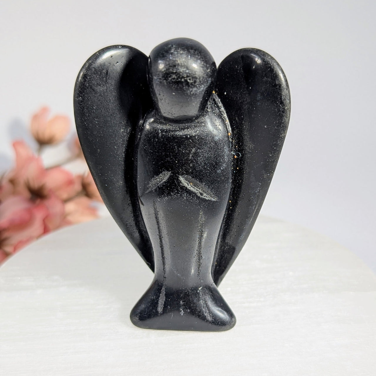 Polished 3-inch black obsidian angel figurine BC0149 with glossy wings