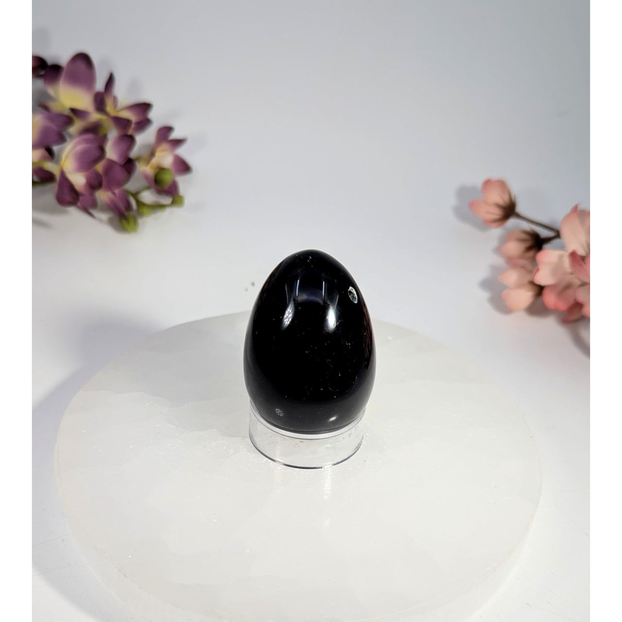 Black obsidian yoni egg with hole, 1-1.5-2 inches, glossy with golden flecks