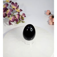 Polished black obsidian yoni egg with hole, 1-2 inches, #BC0477