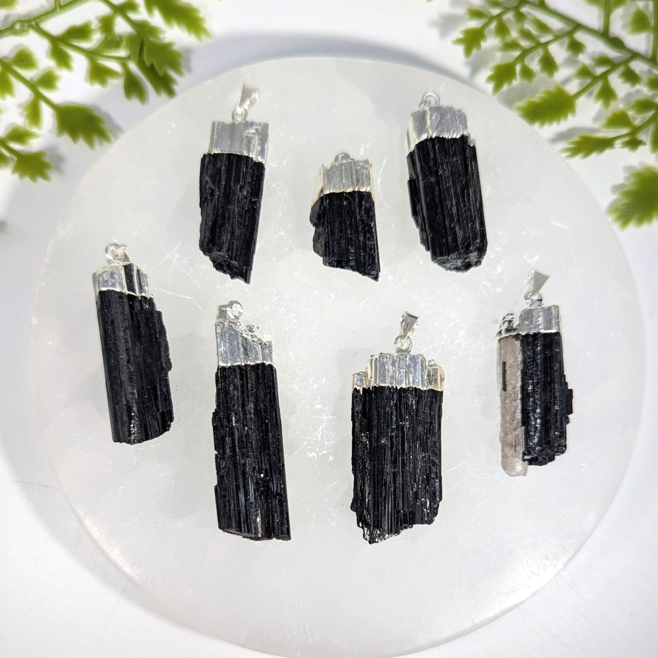 Black tourmaline 1.2-1.5 inch electroplate crystal pendants with silver-toned metal caps for jewelry and gemstones