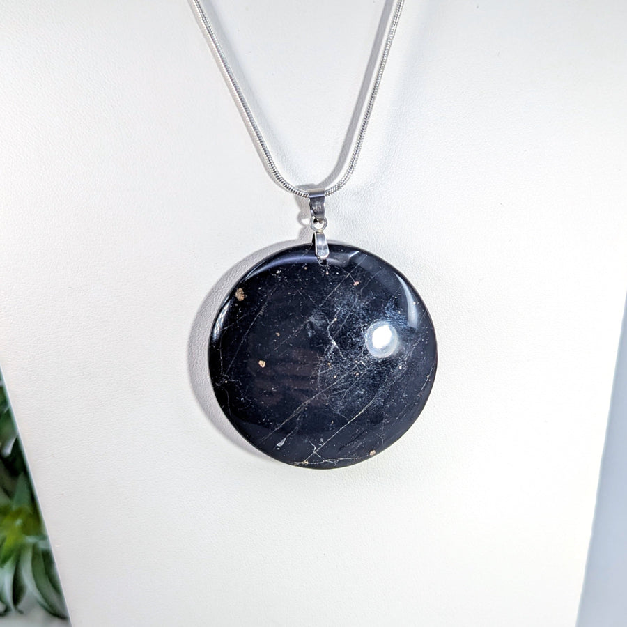 Round black stone pendant necklace featured in Black Tourmaline Medallion Pendant LV8656