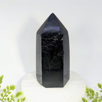 Black tourmaline 5 inch generator tower with polished dark black crystals featuring subtle white veining for jewelry and gemstones