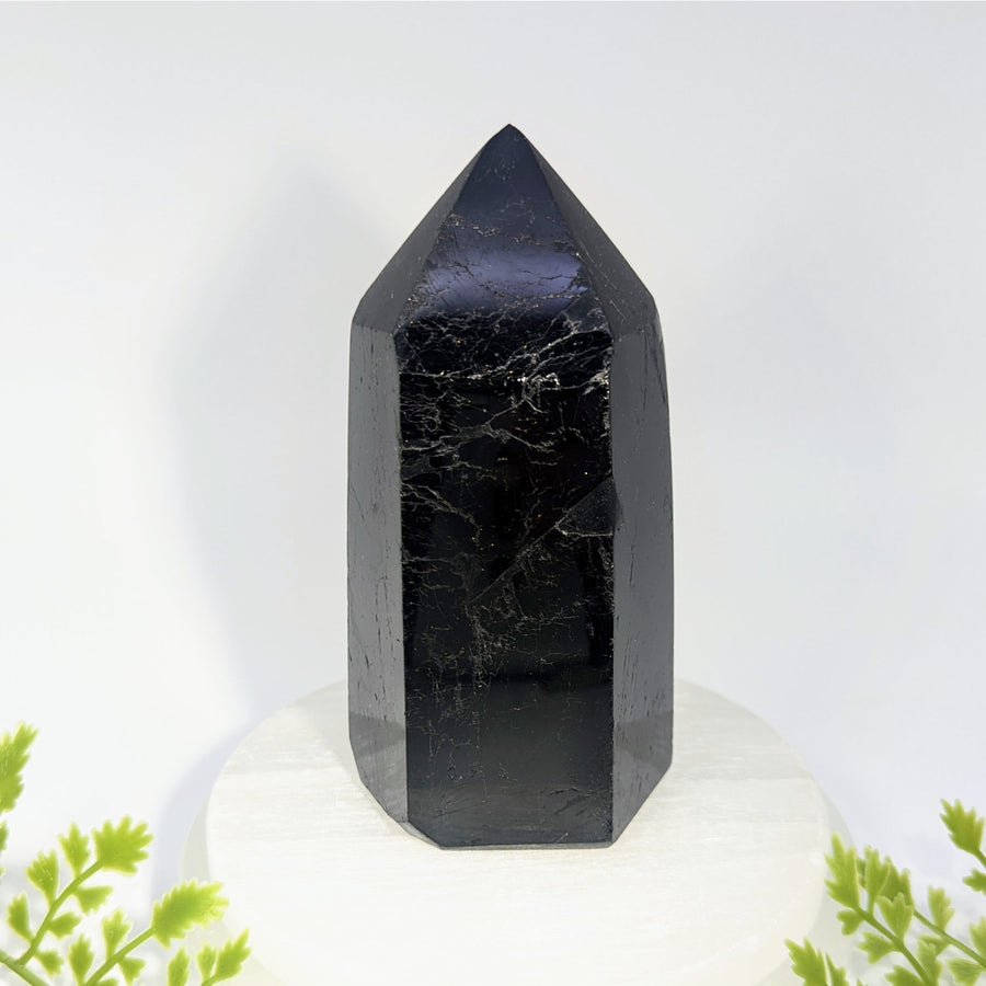 Black tourmaline 5 inch generator tower with polished dark black crystals featuring subtle white veining for jewelry and gemstones