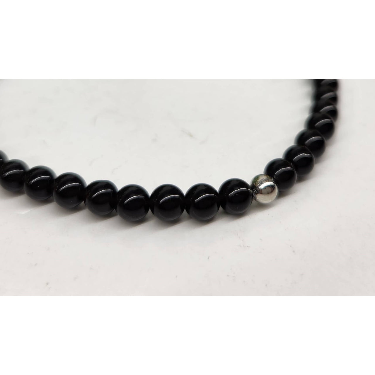 Black Tourmaline Bracelet with small 4mm beads and one silver accent bead