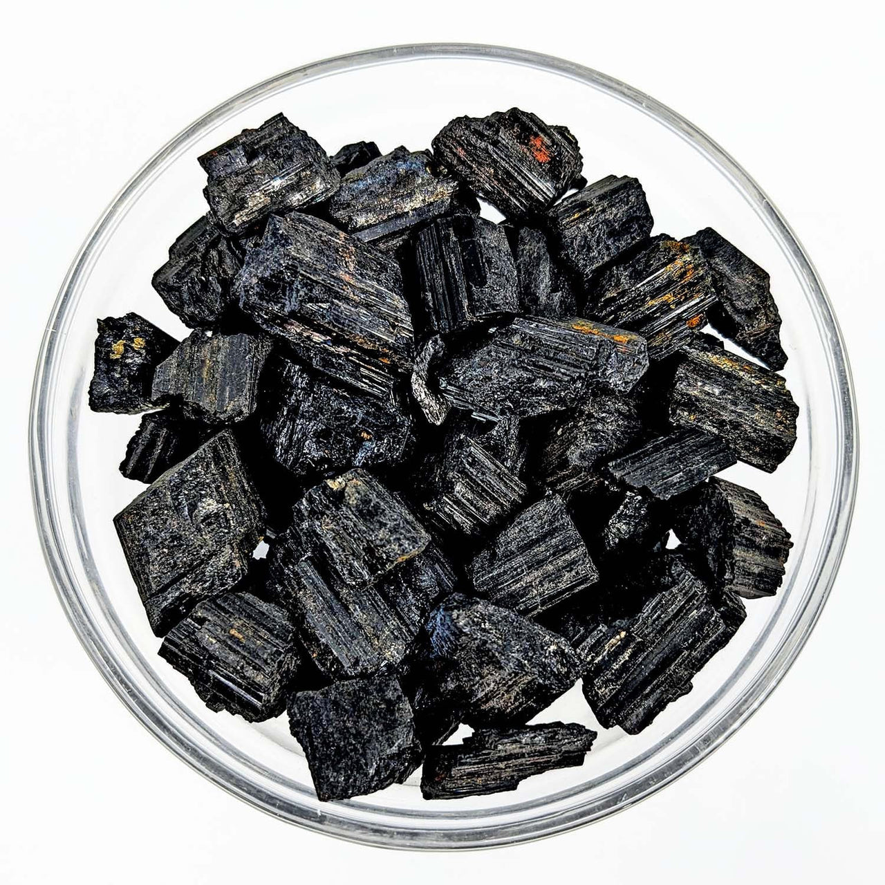Black Tourmaline Rough Natural 1-2 inch in a bowl, ideal for healing and referral history