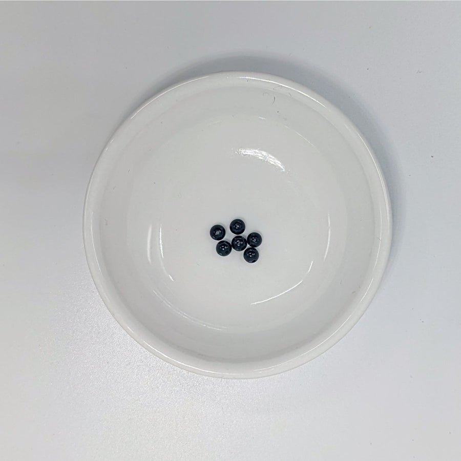 White bowl with dark Black Tourmaline Round Beads for jewelry making and healing