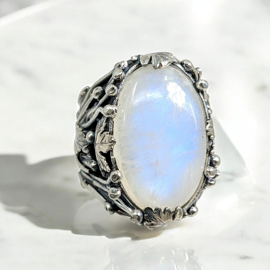 Silver ring with an oval Blue Flash Moonstone in a size 10.5 design