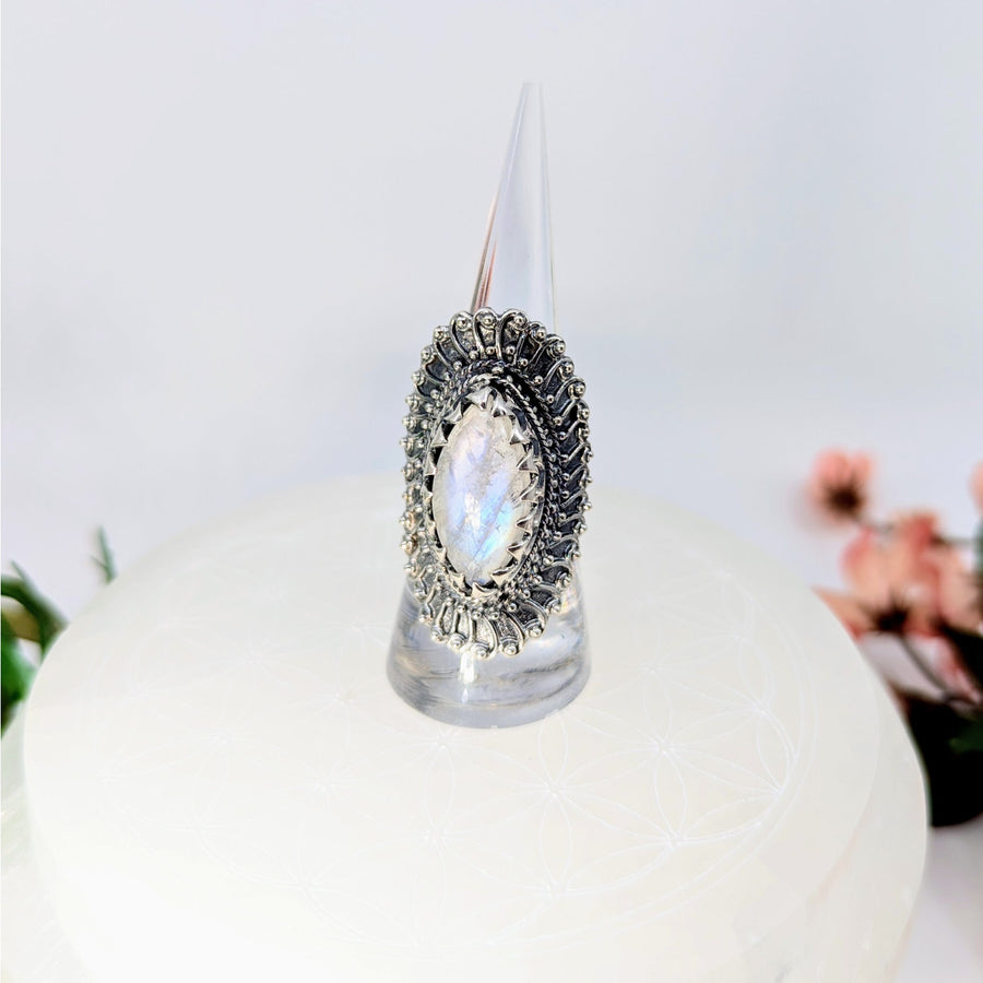 Silver ring with oval Moonstone showcased in Blue Flash Moonstone Sz 7.25 Tribal Jumbo Ring