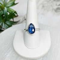 Thumbnail for Blue Kyanite Sz. 10 S.S. Teardrop Ring #LV5024 displayed on a white ring stand