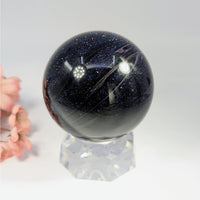 Blue Sandstone 2.8 inch black gold glitter sphere on acrylic stand #BC0129