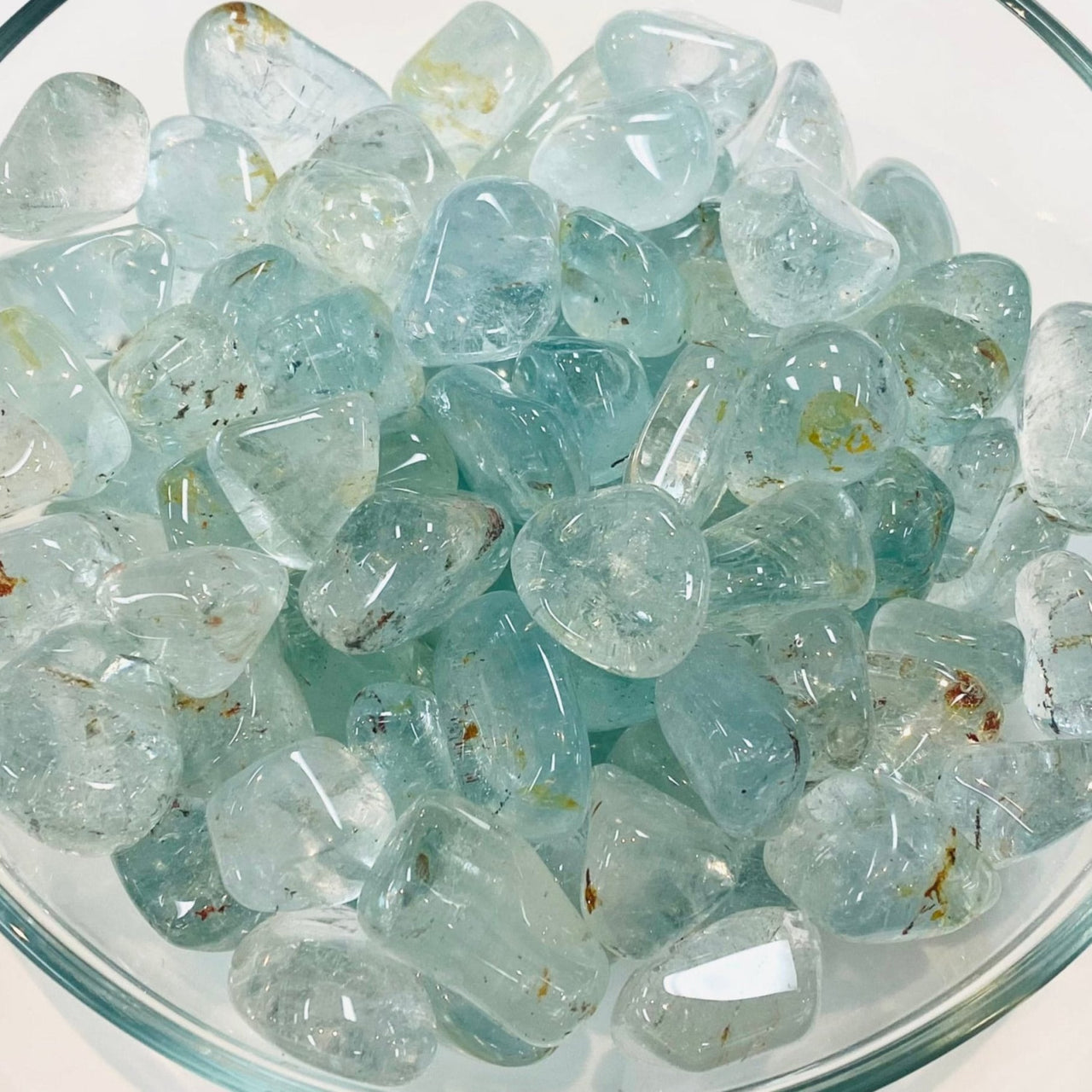 Pale blue and aqua Blue Topaz Tumbled Stones clustered beautifully together