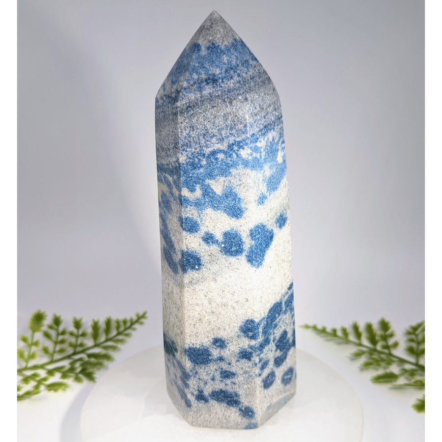 Blueberry quartz 7 inch tower is a tall faceted blue and white crystal tower ideal for jewelry and gemstone collections
