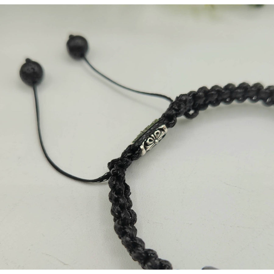 Black braided bracelet with silver accents from CALM/PROTECTION Black Tourmaline and White Howlite bracelet
