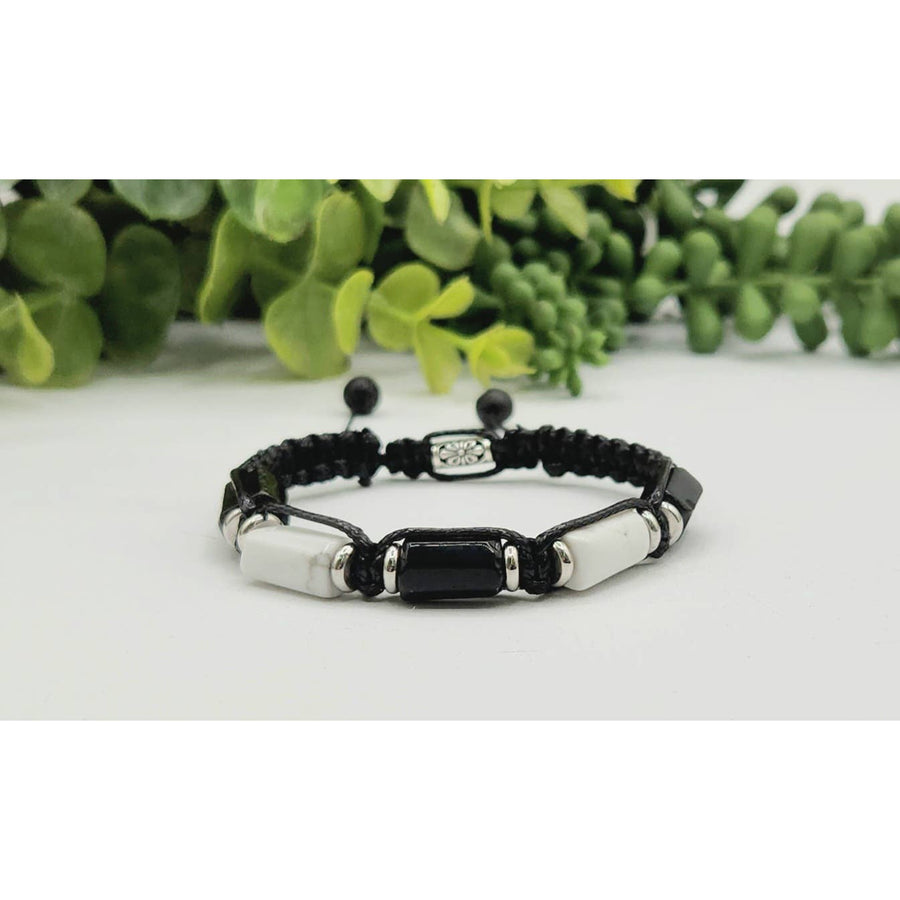 Black and white beaded bracelet featuring Black Tourmaline and White Howlite for protection