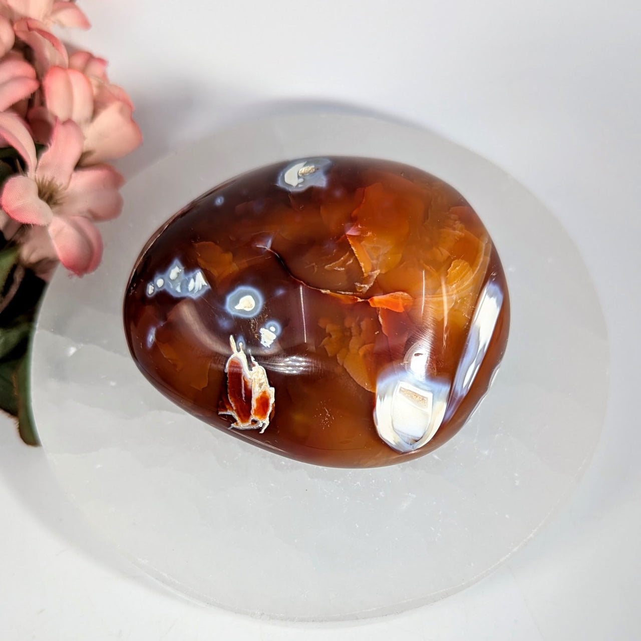 Polished translucent carnelian agate pebble with orange brown swirls, 3 inch #BC0653