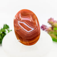 Orange and white striped carnelian agate 2.3 inch palm stone ring BC0067