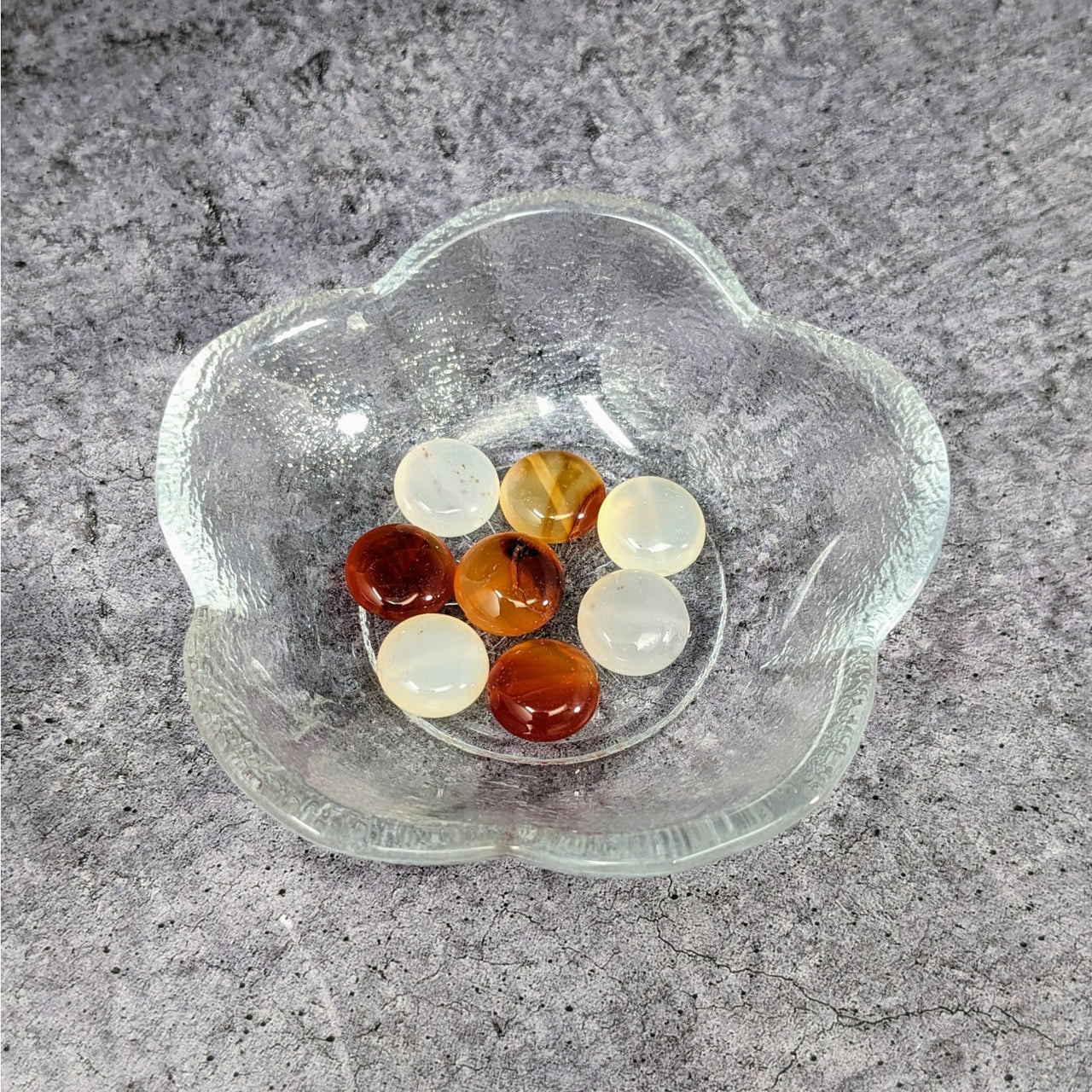 Carnelian Flat Round Bead Pack #LV3663 in a Glass Bowl Filled with Small Pieces of Glass