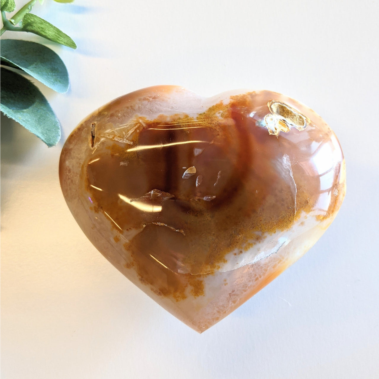 Heart-shaped polished brown Agate crystal with banding patterns for item tier benefits