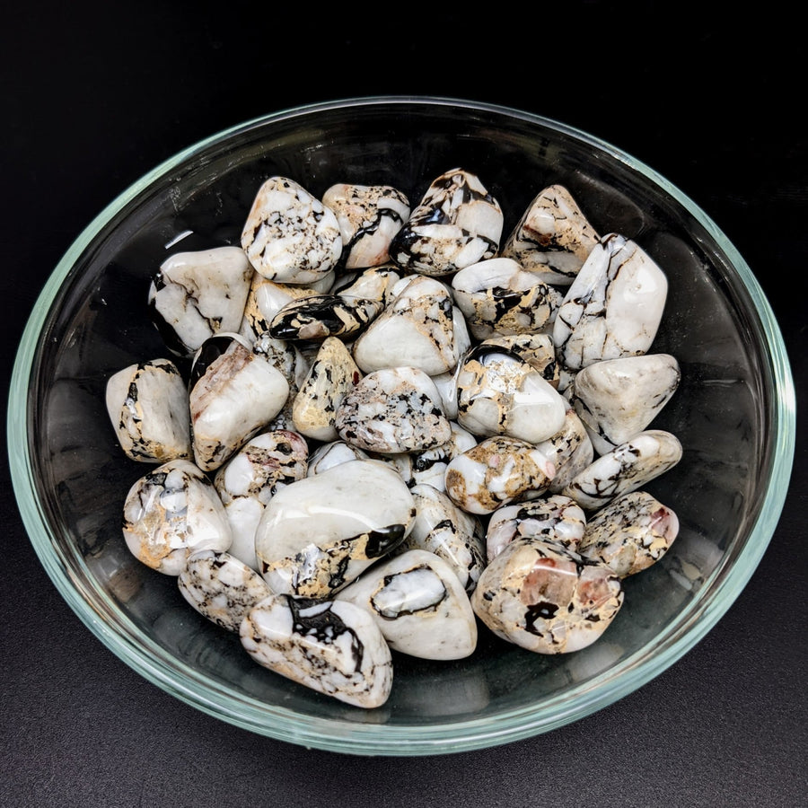 A bowl of tumbled stones from Catacloisite Impact Stone product #LV1273