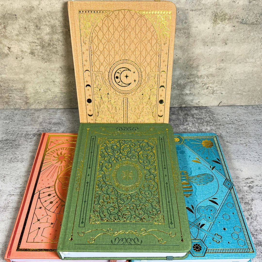 Green and gold Moleskine notebook with celestial designs LV9549