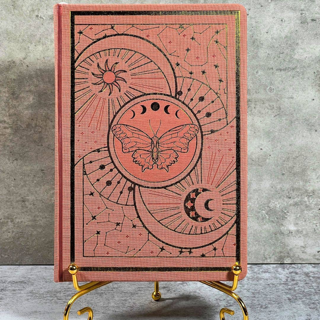 Coral pink leather Celestial Nature journal with moon phases and butterfly