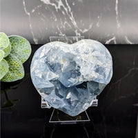 Thumbnail for Heart-shaped ice sculpture with blue ice cube, product: Celestite 2.9’ Geode Heart #LV5712