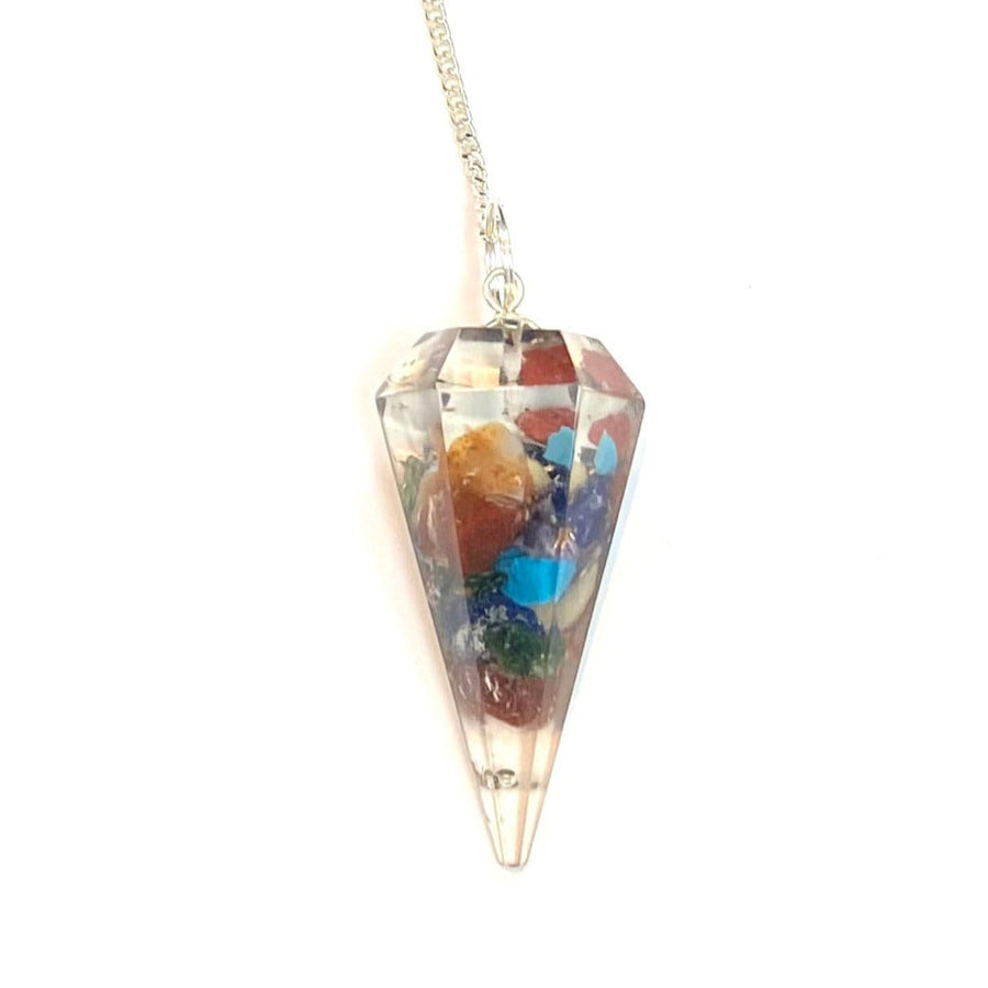 Crystal pendulum pendant for Chakra Orgone Pendulum J589 on a display stand