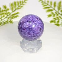 Polished purple chrysocolla 1.4 inch sphere #BC0912 on acrylic stand