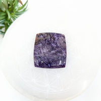 Thumbnail for Square-cut purple Charoite gemstone with swirling patterns in 5’’ cabochon #LV7085