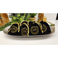 Black velvet rune stone pouch with gold trim for Chevron Amethyst set