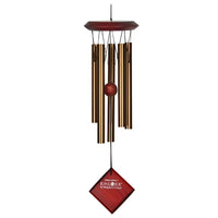 Gold-toned Chimes of Mars Bronze wind chime with wooden accents and red diamond base