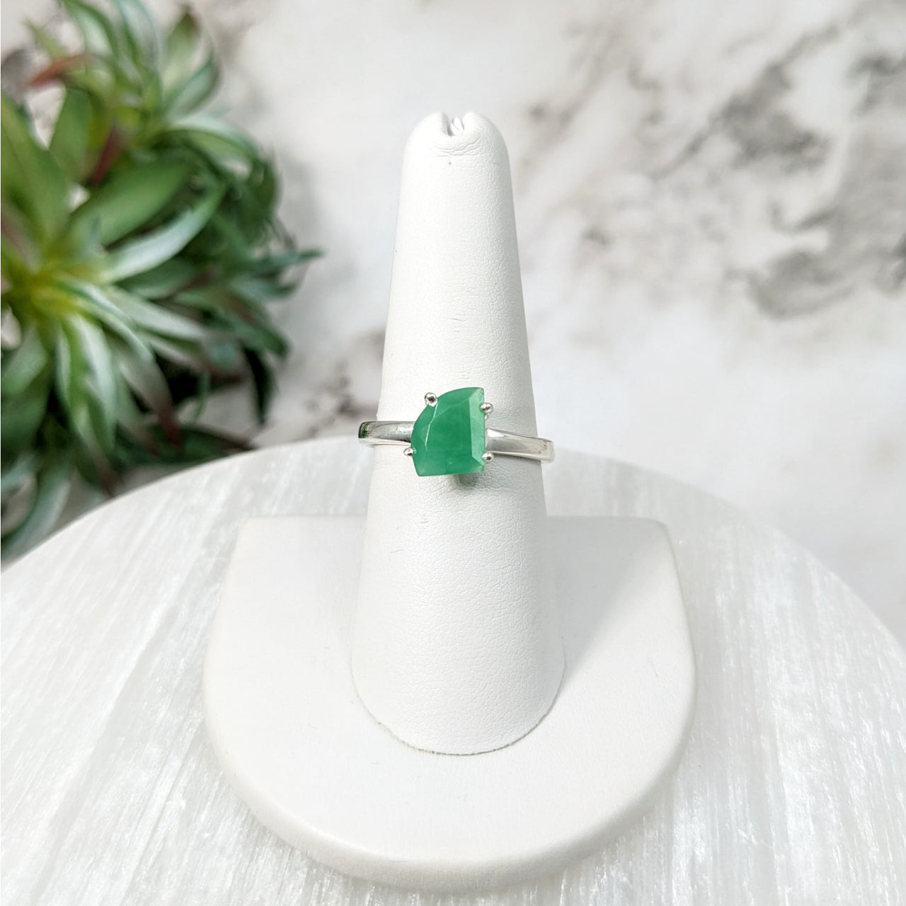 Chrysoprase Sz 9 Faceted S.S. Ring #LV5128: Green Jade Ring on a White Pedestal