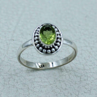 Oval peridot sterling silver ring with beaded bezel, BC0407