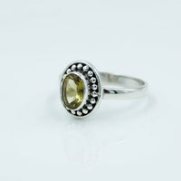 Oval citrine or peridot faceted gemstone in sterling silver ring BC0407