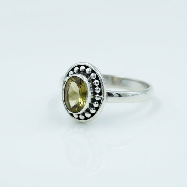 Oval citrine or peridot faceted gemstone in sterling silver ring BC0407