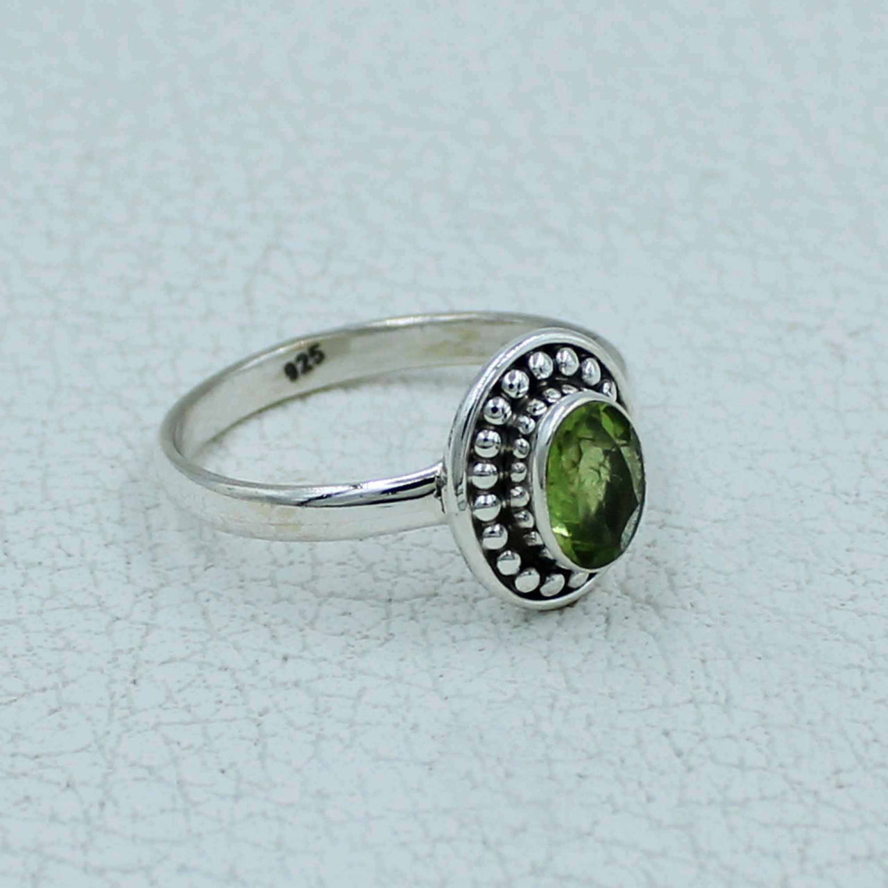 Oval faceted peridot sterling silver ring with beaded bezel, #BC0407