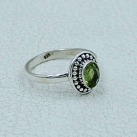 Oval faceted peridot sterling silver ring with beaded bezel, #BC0407