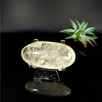 Translucent yellow oval Calcite palm stone for healing and meditation