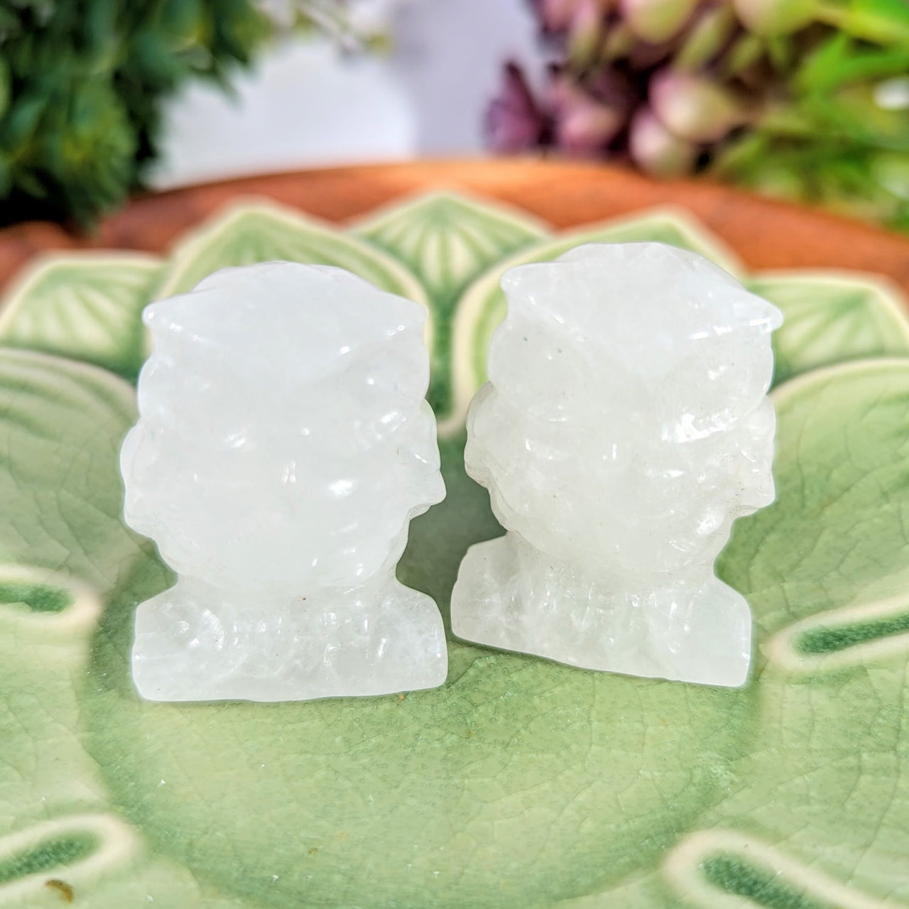 Two 1.4-inch translucent white quartz owl busts, intricately carved with detailed facial features and draped necklines, Clear Quartz #BC0706