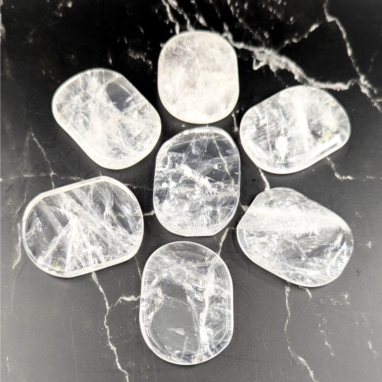 Clear quartz 1.5-2in flat palm stone #BC0765 with fractures