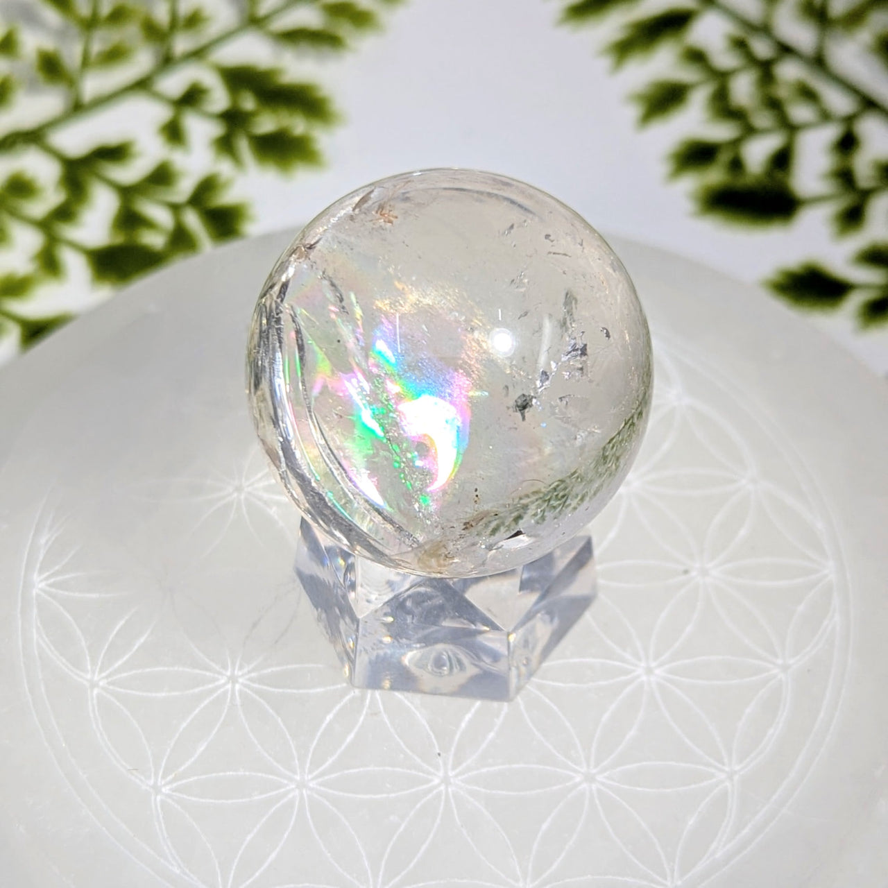 Clear quartz 1.5 inch sphere #BC1215 with iridescent inclusions