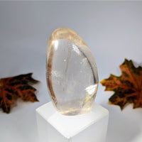 Clear quartz crystal 2.9 inch freeform on white pedestal #BC0116