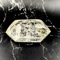 Clear quartz 4.4 inch DT point #BC1248 with inclusions and yellow tint