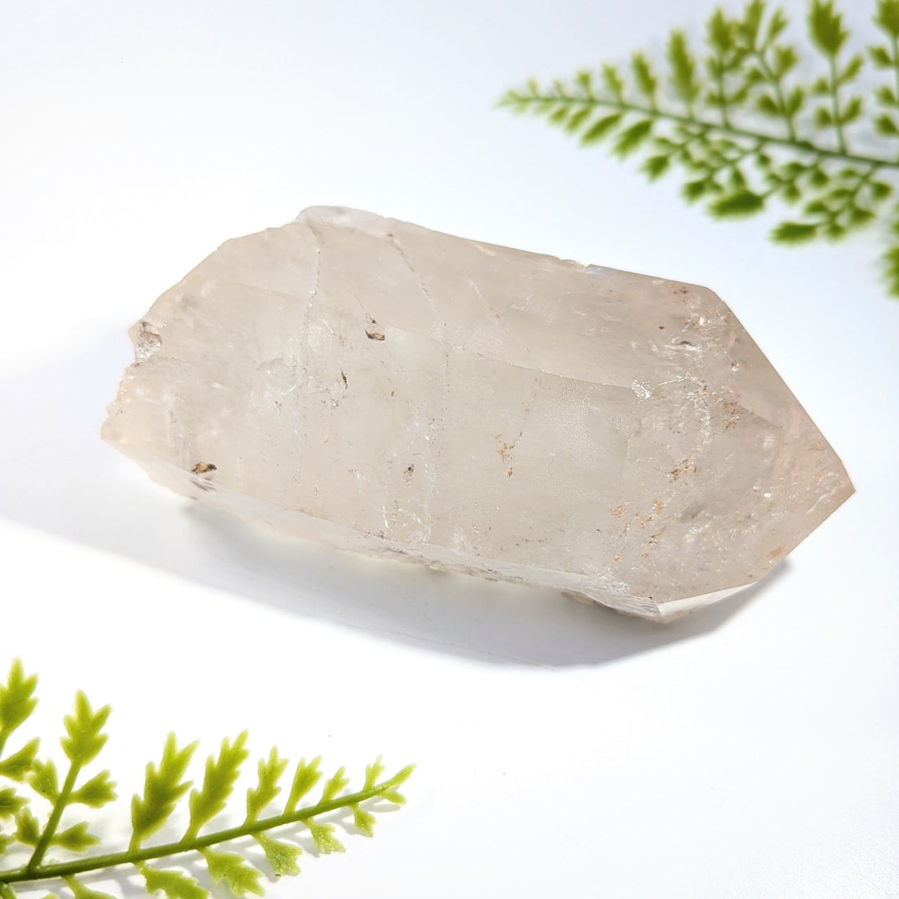 Clear quartz 5.2 natural point translucent pale crystal with natural facets and subtle internal inclusions