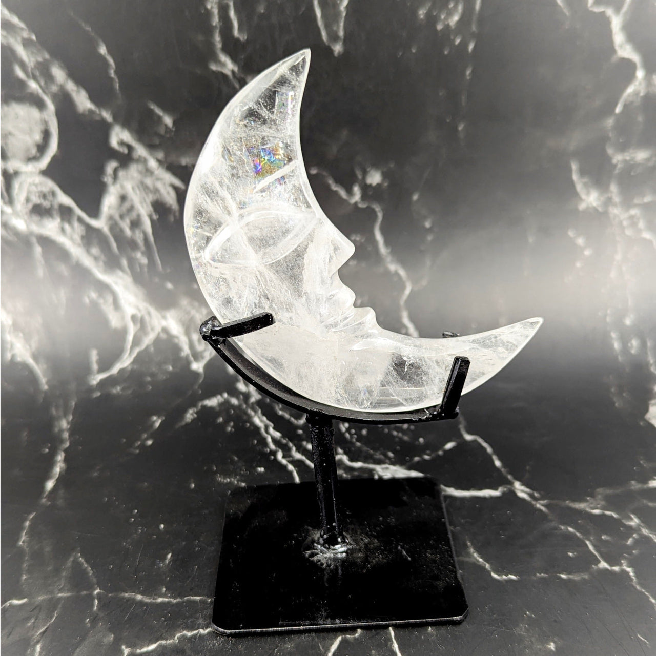 Clear quartz 6-inch crescent moon sculpture with face on stand BC0771