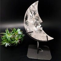 Clear quartz 7-inch crescent moon carving with face on stand LV4403MC